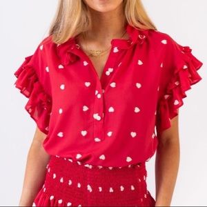 ISO Koch pixie top in red heart size small or medium.